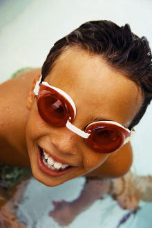 Boy with swimming googles on