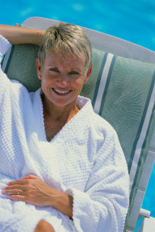 Woman relaxing on chase lounge